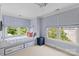 Bedroom features twin beds with window seats and built-in storage at 206 Hillside Ave, Charlotte, NC 28209