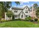 Charming two-story home with manicured landscaping and a well-maintained lawn at 206 Hillside Ave, Charlotte, NC 28209