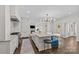 Spacious open kitchen featuring an eat-in island, stainless steel appliances and an open-concept layout at 206 Hillside Ave, Charlotte, NC 28209