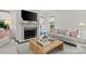 Bright living room with fireplace, large TV, stylish decor, and natural light at 206 Hillside Ave, Charlotte, NC 28209
