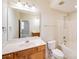 Bright bathroom with vanity, large mirror, and shower over tub combination at 2065 Gable Way Ln, Matthews, NC 28104