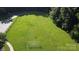 Aerial view of a sports field with soccer goals, surrounded by trees at 2065 Gable Way Ln, Matthews, NC 28104