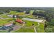Picturesque golf course with a clubhouse, ponds, and lush green fairways, perfect for recreation at 21047 Running Creek Dr # 9, Locust, NC 28097