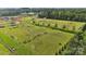 Aerial view of the Locust City Park soccer field with teams practicing on a sunny day at 21047 Running Creek Dr # 9, Locust, NC 28097