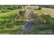 Scenic view of a tree-lined street in a new neighborhood, offering a serene and welcoming atmosphere at 21047 Running Creek Dr # 9, Locust, NC 28097