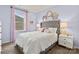 Serene bedroom with pastel walls, tufted headboard, and chic decor at 21055 Running Creek Dr # 10, Locust, NC 28097