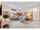 Comfortable living room features neutral colors, plenty of seating, and is perfect for relaxation at 21055 Running Creek Dr # 10, Locust, NC 28097