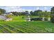 Scenic vineyard property features rows of vines, a pond, a gazebo, and a glimpse of beautiful homes in the background at 21055 Running Creek Dr # 10, Locust, NC 28097