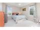 Light-filled bedroom with hardwood flooring, a ceiling fan, and bright windows at 214 Silver Creek Ln, Shelby, NC 28152