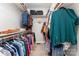 Spacious closet with clothes hanging on racks at 214 Silver Creek Ln, Shelby, NC 28152