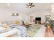 Cozy living room features vaulted ceilings, comfortable furnishings, and a brick fireplace at 214 Silver Creek Ln, Shelby, NC 28152
