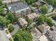 Beautiful aerial shot of residential neighborhood with tree-lined streets and meticulously kept landscapes at 2315 Selwyn Ave # F, Charlotte, NC 28207