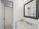 Classic bathroom featuring white vanity, and a framed mirror at 2315 Selwyn Ave # F, Charlotte, NC 28207