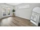 Bright and airy bedroom featuring wood floors, and balcony access at 2315 Selwyn Ave # F, Charlotte, NC 28207