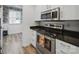 Kitchen featuring stainless steel appliances, and white cabinetry at 2315 Selwyn Ave # F, Charlotte, NC 28207