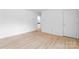 This bedroom is a blank canvas: light wood floors, blank white walls and natural light at 2328 Danforth Ln, Charlotte, NC 28208