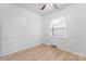 Bright bedroom featuring wood floors, window and light color walls at 2328 Danforth Ln, Charlotte, NC 28208
