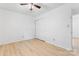 A comfortable bedroom with a closet and a neutral color scheme, offering a serene retreat at 2328 Danforth Ln, Charlotte, NC 28208