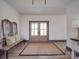 Charming entryway with a rustic bench, stylish rug, and elegant decor at 2410 Charlotte Hwy, York, SC 29745