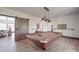 Entertaining game room featuring a billiard table and a sliding barn door to the living space at 2410 Charlotte Hwy, York, SC 29745
