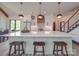Bright open kitchen with a large center island, pendant lights, and seating at 2410 Charlotte Hwy, York, SC 29745