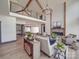 Open-concept living room features a fireplace, soaring ceilings, and a cozy seating area at 2410 Charlotte Hwy, York, SC 29745