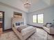 Bright main bedroom with tray ceiling, ensuite access, and lots of natural light at 2410 Charlotte Hwy, York, SC 29745