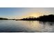 Enjoy serene lake views and golden sunsets near this waterfront property at 245 Enwood Dr, Charlotte, NC 28214