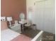 Charming bedroom with a white vanity, pink accents, and a cozy atmosphere at 2592 Tully Ct # 78, Lancaster, SC 29720