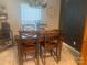 Inviting dining area with a classic wooden table, modern chandelier, and tasteful decor for memorable meals at 2592 Tully Ct # 78, Lancaster, SC 29720