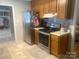 Well-equipped kitchen featuring stainless steel appliances, tiled backsplash, and generous storage space at 2592 Tully Ct # 78, Lancaster, SC 29720