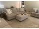 Comfortable living space featuring neutral tones, plush seating, and a stylish rug, creating a welcoming atmosphere at 2592 Tully Ct # 78, Lancaster, SC 29720