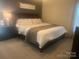 Serene bedroom featuring a comfortable bed, bedside table, and soft lighting for restful nights at 2592 Tully Ct # 78, Lancaster, SC 29720