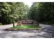 Welcoming entrance to Lake Norman State Park with stone accents and signage, inviting visitors to explore the natural beauty at 296 Hicks Creek Rd, Troutman, NC 28166