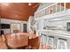 Open floor plan featuring a kitchen with a breakfast bar, loft and a dining area near glass doors at 296 Hicks Creek Rd, Troutman, NC 28166