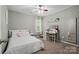 Neutral bedroom showcasing natural light, and a vanity area at 3005 Streamlet Way, Monroe, NC 28110