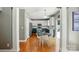 Modern eat-in kitchen featuring white cabinets, stainless appliances, and a view to the exterior at 3005 Streamlet Way, Monroe, NC 28110