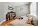 Comfortable living room with sectional sofa, record player, and hardwood floors at 3005 Streamlet Way, Monroe, NC 28110