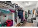 Organized walk-in closet with shelving, hanging rods, and ample storage for clothes and accessories at 3005 Streamlet Way, Monroe, NC 28110