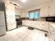 Spacious kitchen with white cabinetry, stainless steel appliances, and ample counter space at 3158 Salisbury Hwy, Statesville, NC 28677