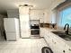 Bright kitchen features white cabinetry, stainless appliances, and ample storage at 3158 Salisbury Hwy, Statesville, NC 28677