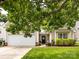 Inviting home with attached garage, black door and lush green lawn at 3347 Xandra Ct, Indian Land, SC 29707