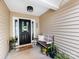 Welcoming front porch with a decorative door and cozy bench at 3347 Xandra Ct, Indian Land, SC 29707