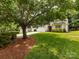 Well maintained lawn and mature trees frame the home at 3347 Xandra Ct, Indian Land, SC 29707