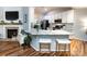 The updated kitchen offers granite counters, stainless appliances, and bar seating at 3347 Xandra Ct, Indian Land, SC 29707