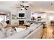 Inviting living room featuring a cozy fireplace and seamless flow to the modern kitchen at 3347 Xandra Ct, Indian Land, SC 29707