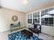 A cozy patio includes a comfortable seating area, ideal for relaxing and enjoying the outdoors at 3347 Xandra Ct, Indian Land, SC 29707