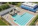 Inviting community pool area with a waterslide, lounge chairs, and a clubhouse in a beautiful outdoor setting at 3347 Xandra Ct, Indian Land, SC 29707