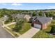 Bird's-eye view of a brick home with a well-manicured lawn in a suburban neighborhood at 3419 Brickyard Ln, Midland, NC 28107