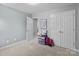 Cozy bedroom with light grey walls, a closet, and simple décor, perfect for a or guest at 3419 Brickyard Ln, Midland, NC 28107